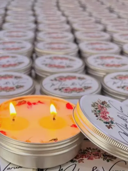 These double-wick tin candles were customized for a wedding with a beautiful floral label featuring the couple's initials.