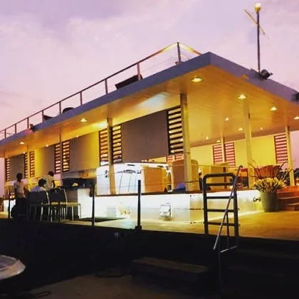 An earlier floating restaurant project we designed in Goa, captured at dusk. This project demonstrates our experience in creating unique waterfront hospitality venues, with a focus on open-air structures and atmospheric lighting that enhances the natural setting.