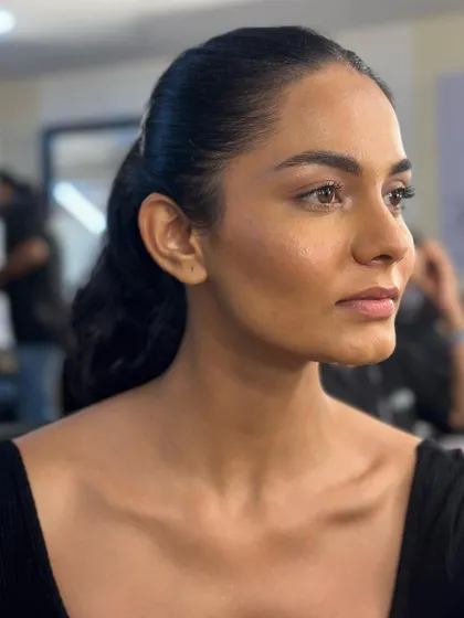 Another angle of the clean, glowing makeup for the Gaurav Gupta couture show. The focus is on a perfectly prepped base to achieve that luminous effect.