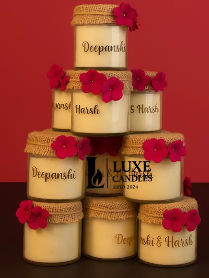 Personalization is at the heart of what I do. For Deepanshi and Harsh's wedding, I created these rustic jute-wrapped candles with their names, making for a truly memorable and personal return gift for their guests.