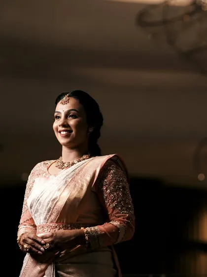 Another elegant portrait of the bride, showcasing the timeless beauty of her ensemble.
