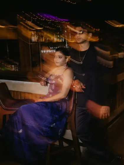 An artistic shot using slow shutter speed to create a motion blur effect. This technique captures the energy and dynamic atmosphere of a cocktail night, resulting in a unique and creative portrait.
