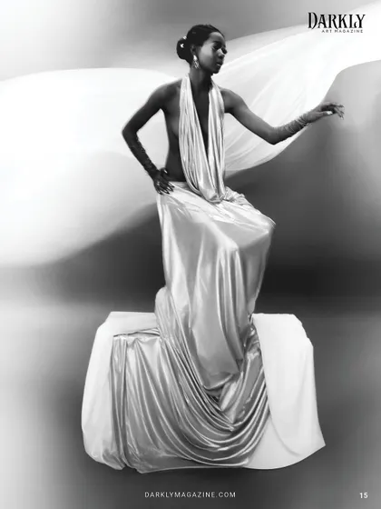 An inside look at the "Ascension" editorial. The makeup and hair are sculpted to create a statuesque, almost divine quality, transforming fashion into a piece of art.