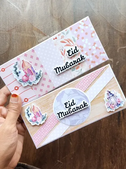 Two of my handmade Eidi envelopes, featuring beautiful lantern and floral designs. They add a personal touch to your Eidi gifts.