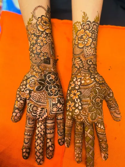 A beautiful floral design with a mix of light and dark shading, creating a rich and textured look.
