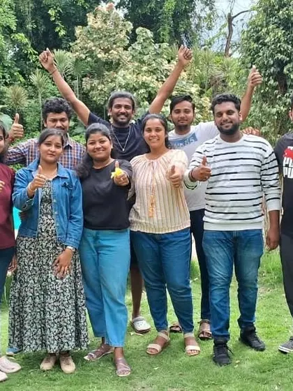 This team is full of energy and enthusiasm after their day outing. We aim to create a positive and vibrant atmosphere for every corporate event.