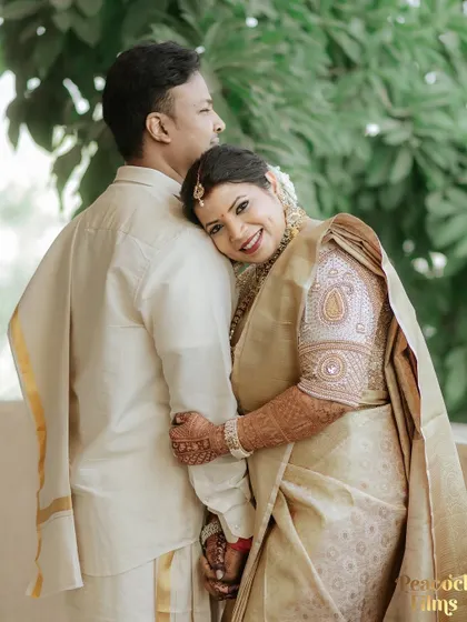 A tender moment where the bride rests her head on the groom's back, a gesture of trust and affection.