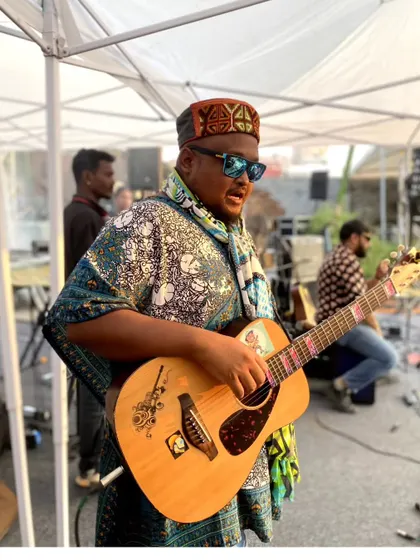 A candid shot during soundcheck. Making sure my guitar is ready and my look is on point before hitting the stage.