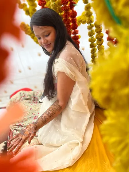 A candid shot of my beautiful bride Simran during her mehndi application.