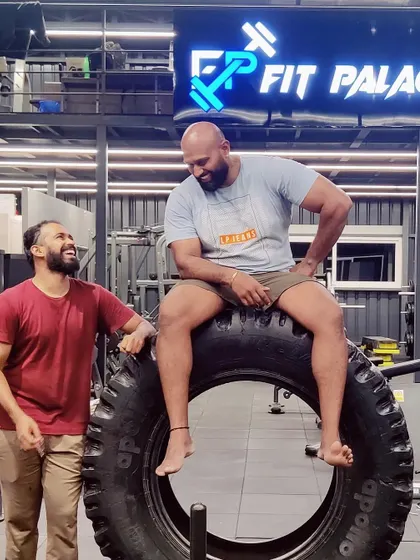 A duplicate of the lighthearted moment with a friend at the gym.