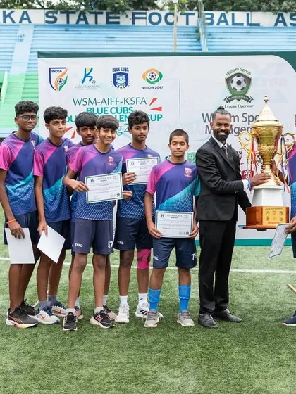 The winning U17 squad posing with their coaches and the WSM league championship trophy. A proud moment for the entire BYFL family, from players to parents and staff.