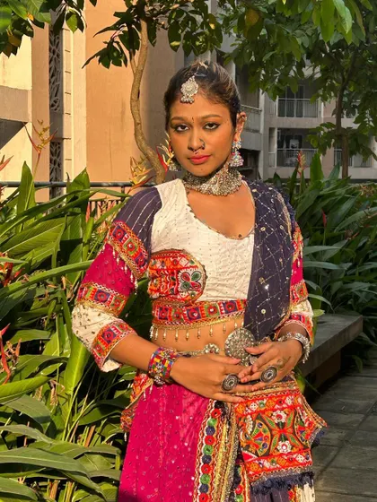 A closer look at the 'Gangubai' style outfit, highlighting the oxidized silver jewelry and the detailed embroidery on the blouse.