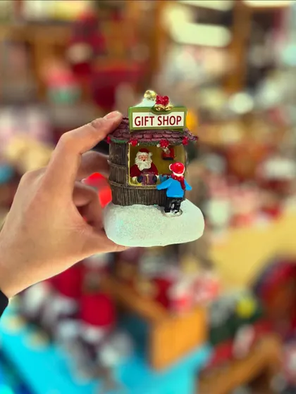 Looking for Christmas gifts? I’ve got the cutest little stuff for everyone on your list, like this tiny Santa's gift shop ornament.