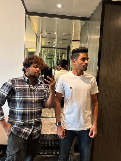 A profile shot of Abhimanyu Easwaran's classic haircut.