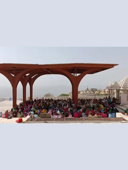 The construction of modern timber pavilions at the historic temple site in Palitana, Gujarat. These structures provide shaded gathering spaces for pilgrims, and their innovative wooden forms create a contemporary dialogue with the ancient stone temples.