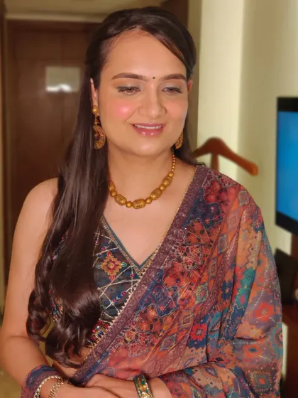Mallika looking fresh and radiant. This is a perfect example of a "no makeup" makeup look that enhances your features without feeling heavy.