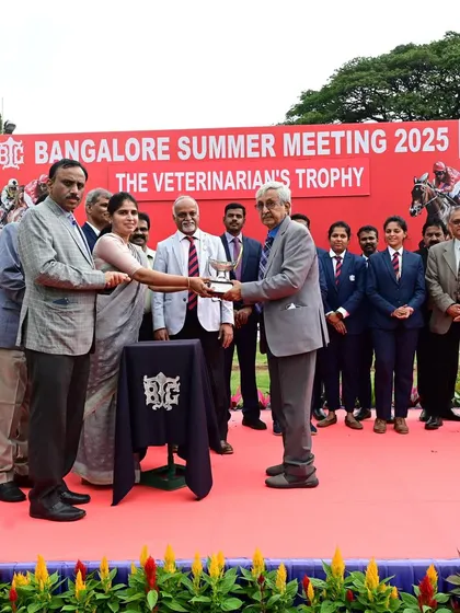 Ms. Shreerupa IAS presents The Veterinarian's Trophy to the winning connections of Fortunate Son.