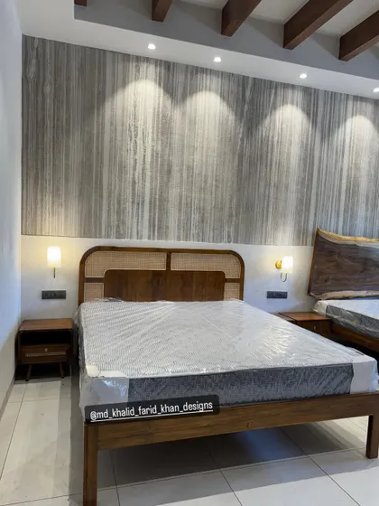 Another view of the hotel room with two beds, showing how different headboard styles can be used in the same space for a unique yet cohesive look.