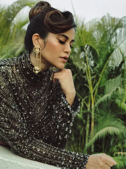 A moment of quiet elegance with Aaditi Pohankar. This look features a soft, smokey eye and a sculpted brow, paired with a vintage-inspired updo.