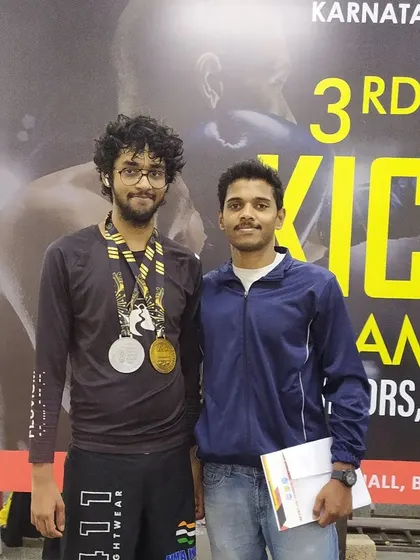 I'm incredibly proud of my students. Here is one of our fighters after winning medals at the 3rd State Level Kickboxing Championship. We don't just train, we build champions.