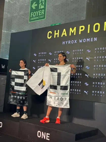 On the podium as a HYROX Women's Champion. This isn't just about winning; it's about representing the power and potential of female athletes. I am passionate about helping other women find their strength.