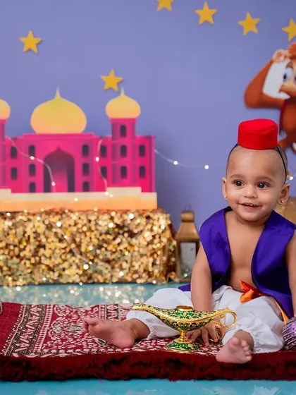 A throwback to this adorable Aladdin-themed session. We can create setups for princes too, complete with a magic carpet and a friendly Abu.