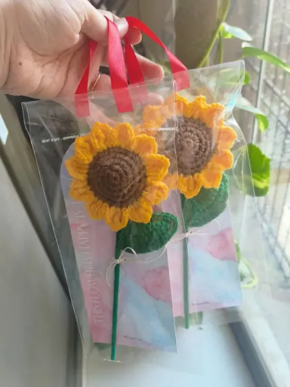 Two of our single sunflower bouquets, packaged and ready to bring smiles to two lucky people.