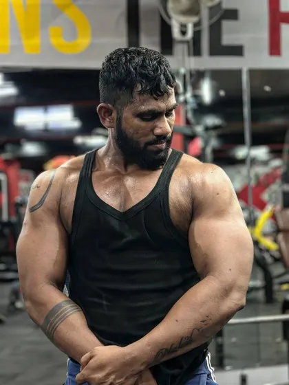 A closer look at the muscle definition. The details are what separate a good physique from a great one.