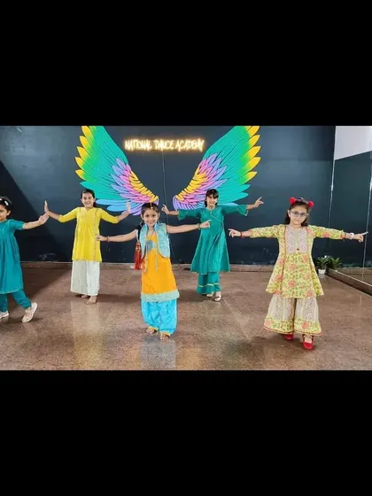 Our young students striking a pose. We teach them how to present themselves with confidence, a skill that goes far beyond the dance floor.