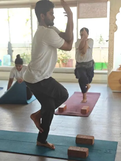 Garudasana (Eagle Pose) is a powerful balancing posture that improves focus and strengthens the ankles and calves. Our TTC students practice this pose to understand the interplay between stability and flexibility.