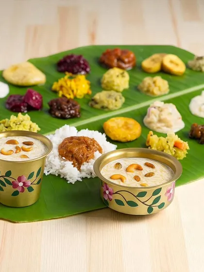 A traditional Onam sadhya served with payasam in our hand-painted brass davara cups. These accents add a touch of elegance to any festive meal.