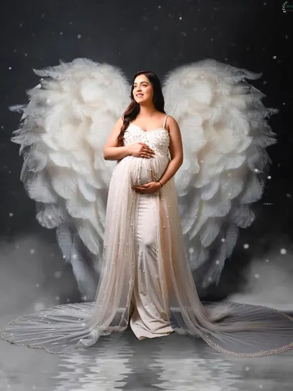 An angelic portrait of Palak Vij, complete with beautiful white wings, creating a dreamy and ethereal feel.