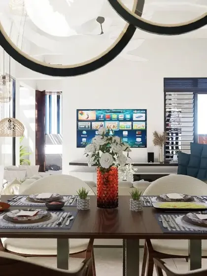 A render of a bright and airy dining and living space we designed. The focus was on bringing in as much natural light as possible, with large windows and a light color palette. The circular pendant lights add a modern, sculptural element to the room.