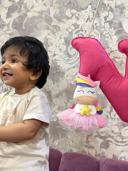 An adorable little one enjoying his Rakhi gift. These happy photos from clients truly make my day.