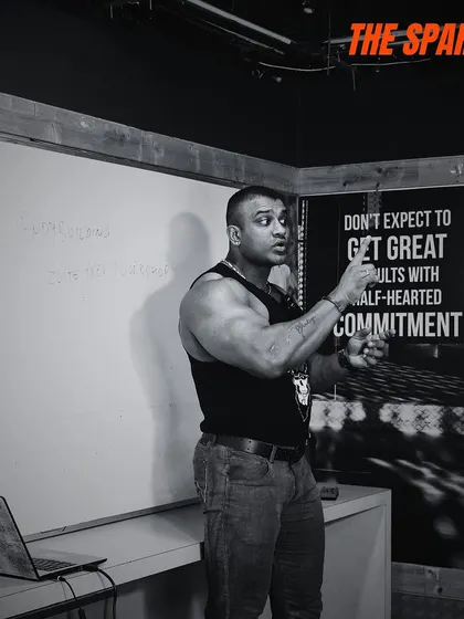 A recap from my Spartan's Elite Contest Prep Workshop. Here I am at the whiteboard, breaking down complex topics. My goal is to educate the next generation of athletes and coaches.
