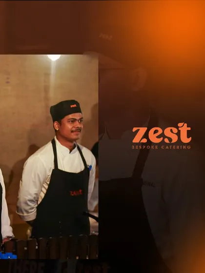 A smiling chef from our team, ready to serve.