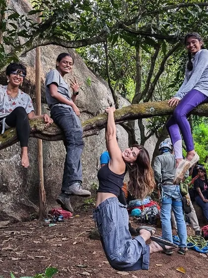 Nikitha and her friends hanging out on a tree at the crag. The social aspect and the friendships formed are a huge part of the BCI experience.