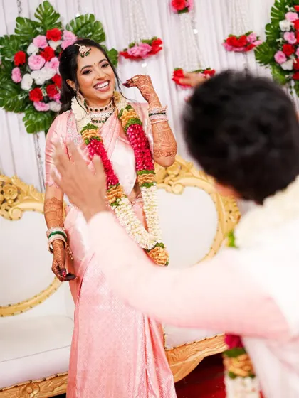 A magical celebration for this Iyer bride's engagement. Her joy is infectious as she dances, her soft pink saree and glowing makeup looking absolutely perfect.