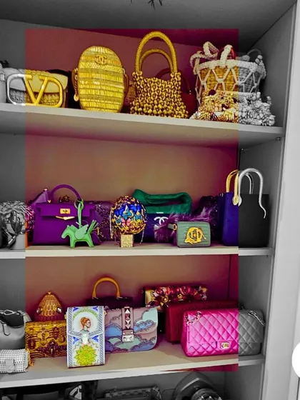 A collection of beautiful handbags should be a source of joy, not clutter. We arrange them on shelves by size and color, making them a beautiful feature of the wardrobe while keeping them in perfect condition.