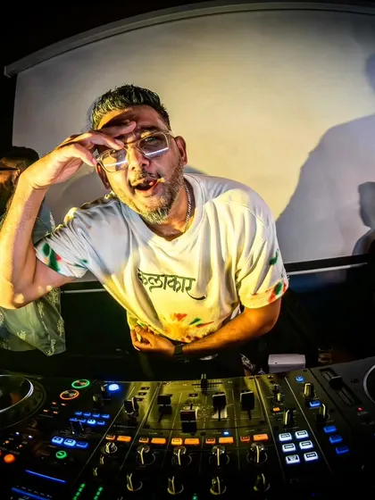 A DJ is an artist, a 'कलाकार'. This shot captures the focus and passion I bring to every single performance, whether I am behind the console or interacting with the crowd.