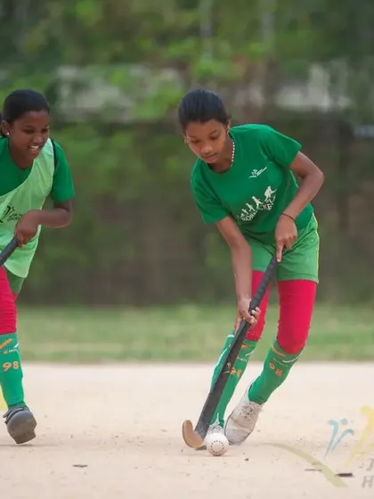 Teammates working together to move the ball up the field during the 2022 camp.