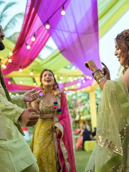 The couple sharing a dance at their outdoor evening party in Goa.