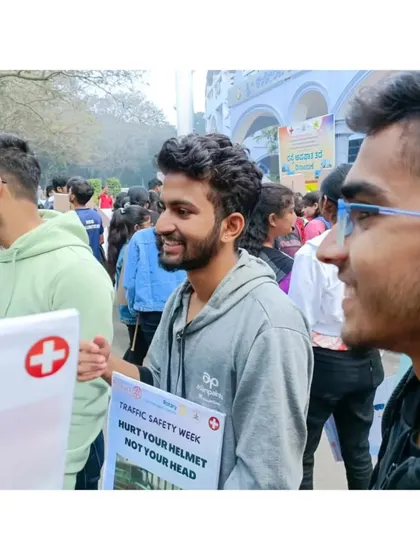 Participating in the rally, spreading the message of road safety.