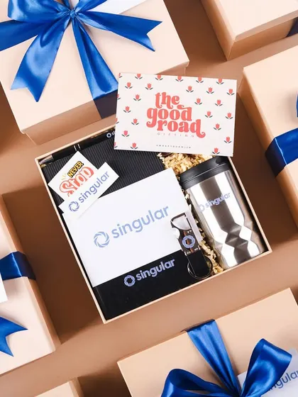 The final presentation of the Singular welcome kits, tied with a beautiful royal blue satin ribbon. The finishing touches are just as important as the contents.