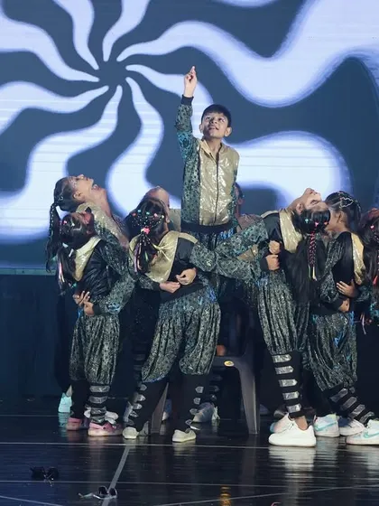 An impressive lift formation from the "Jhoome Jo Pathaan" performance, highlighting the strength and teamwork of our dancers.