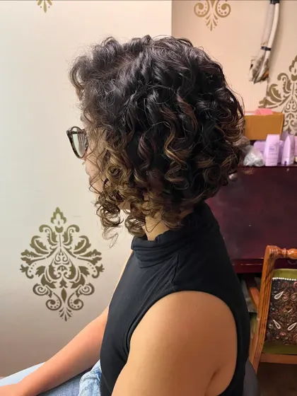 A side view of the highlighted curly bob.