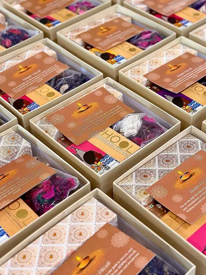 A closer look at the corporate Diwali hampers for BDI Plus, each with a custom card and festive goodies.