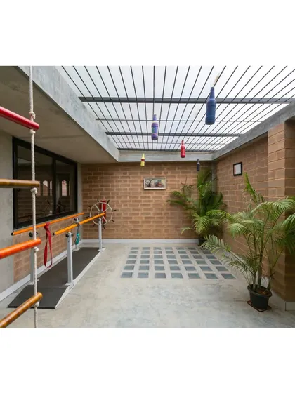A duplicate of image 25, showing a therapy area at the Mathru Centre.