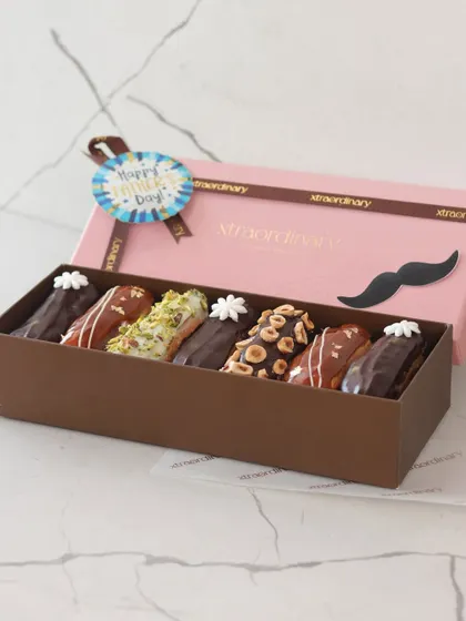 We create special dessert boxes for every occasion, like this Father's Day box of assorted eclairs. It's the perfect way to treat the dads in your life.
