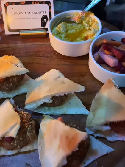 We served "Stapled Lebanese Bites" for a Halloween party, featuring falafel in pita bread with hummus and pickled vegetables for a ghoulishly good treat.